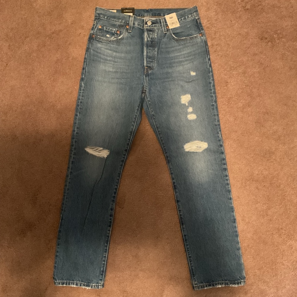 Levi's High Rise Blue Jeans with Distressed Details